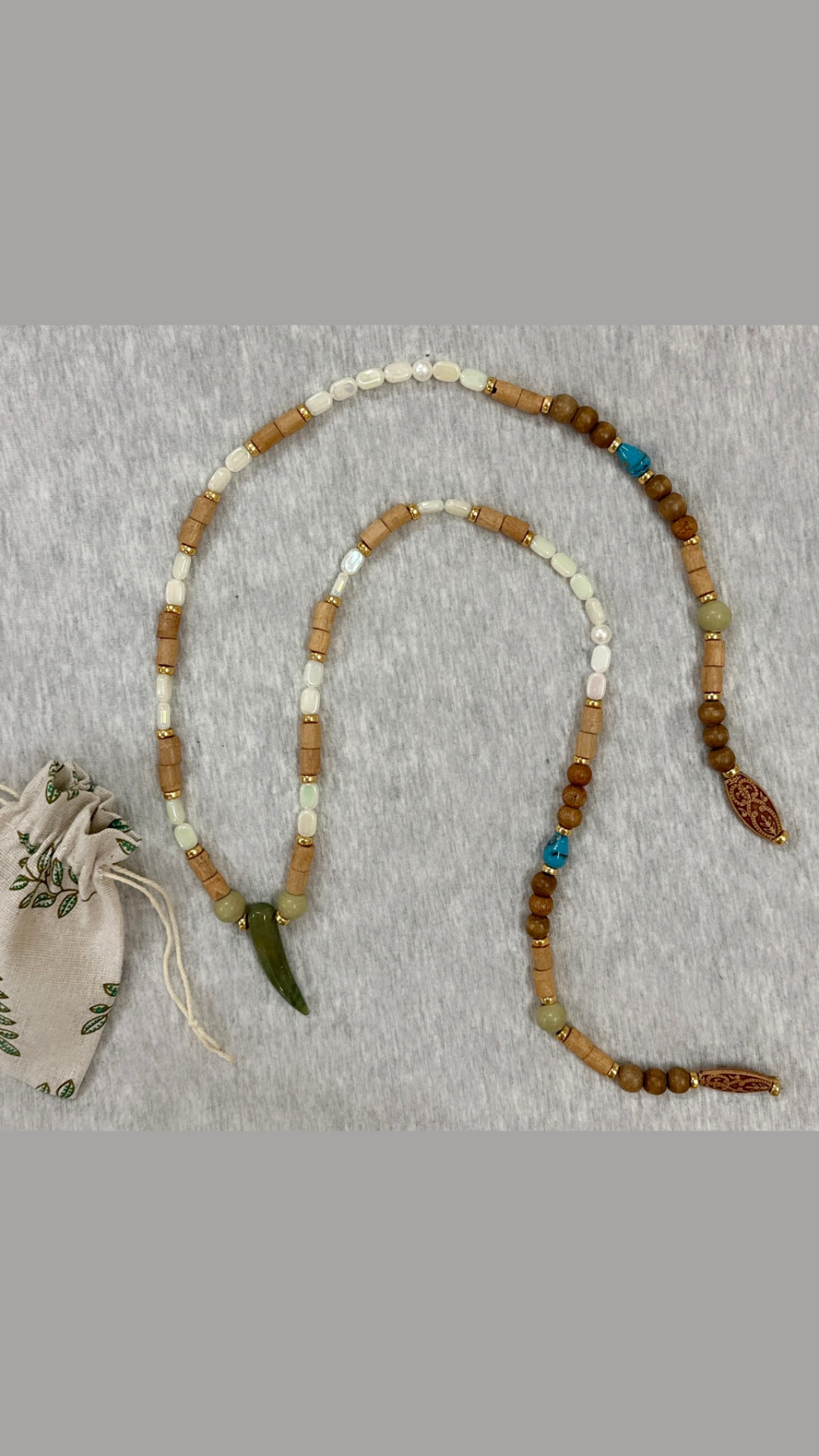 Olive tusk and beads